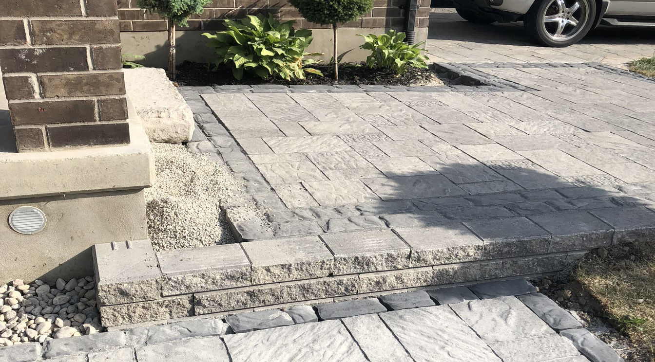Paver Front Entry, Steps and Walkway with Borders in London Ontario region, a project by O'Connor Stone & Landscape, a landscae and hardscape contractor.