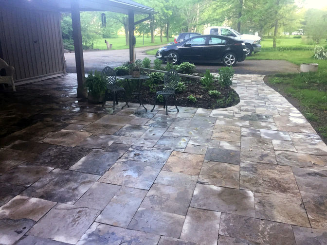 Square cut flagstone patio & walkway. A stone patio project in London Ontario region by O'Connor Stone & Landscape.