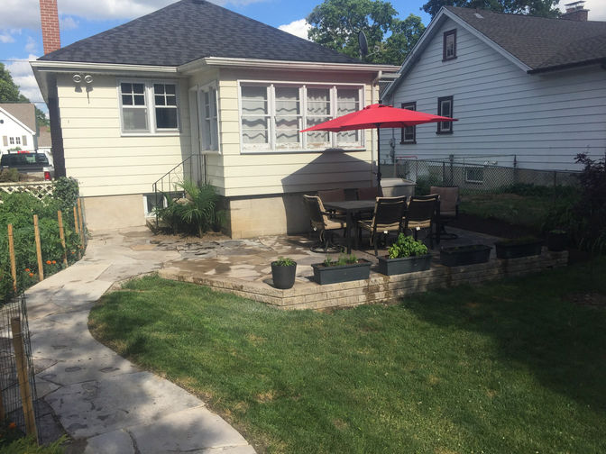 Natural flagstone patio and walkway. A stone patio project by O'Connor Stone & Landscape