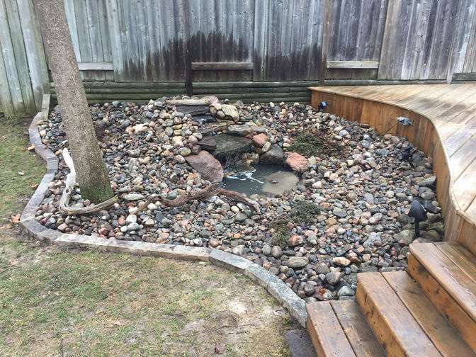 Stone water feature. A project in London Ontario region by O'Connor Stone & Landscape